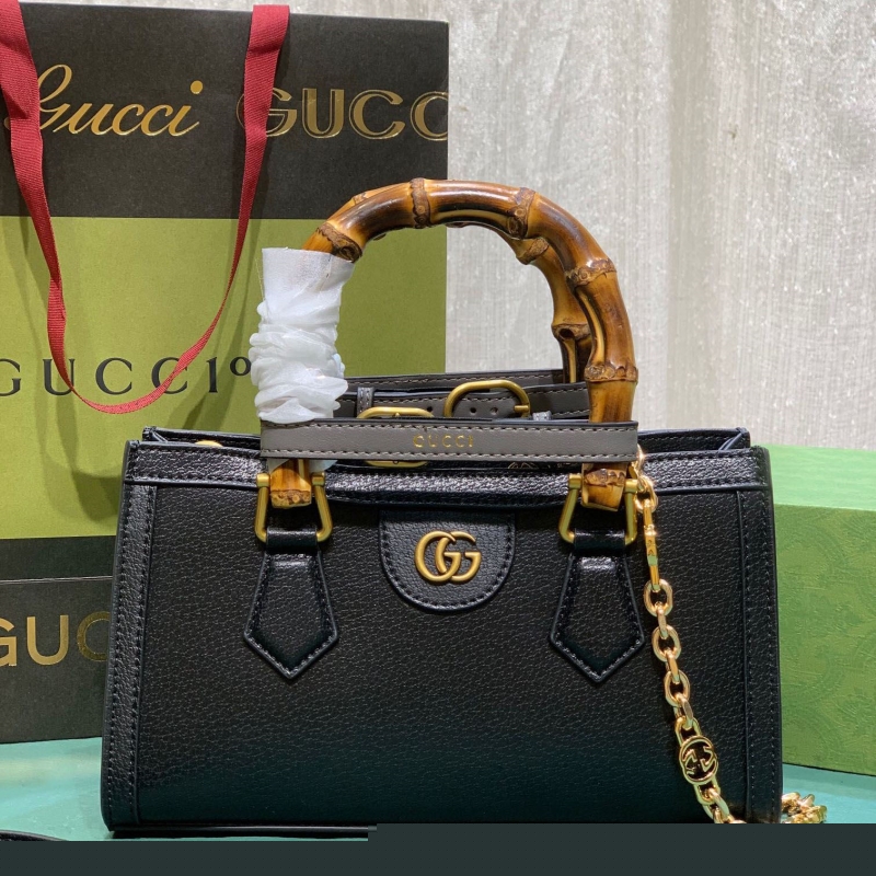 G*u*i top handle bags